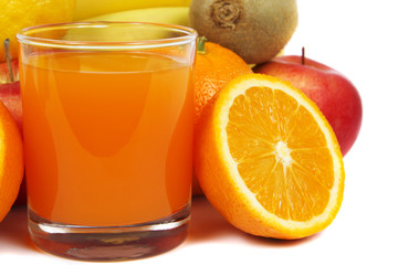 glass of juice and fresh fruits