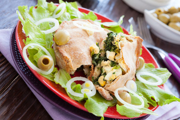 Tasty nutritious pie with eggs and spinach