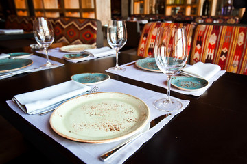 Served table with empty glasses at restaurant
