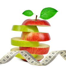 Apple mix with measuring tape isolated on white