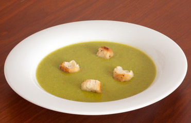 Traditional fresh pea soup in the bowl