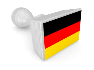Wooden stamp with german flag.