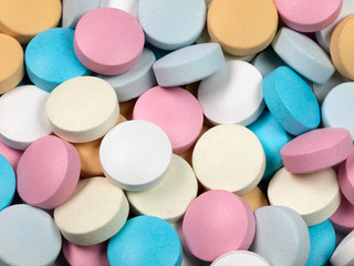 Many multi-coloured pills.