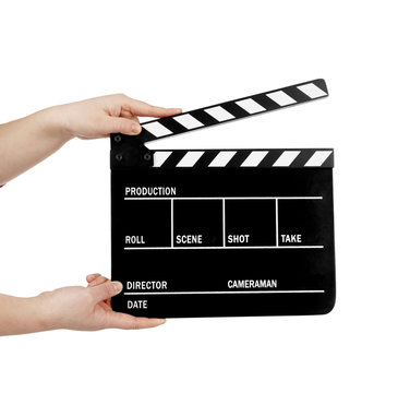 human hand holding a movie clapboard