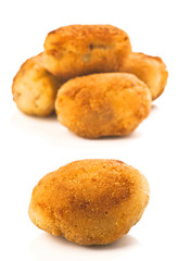 group filled with gold croquettes on white base
