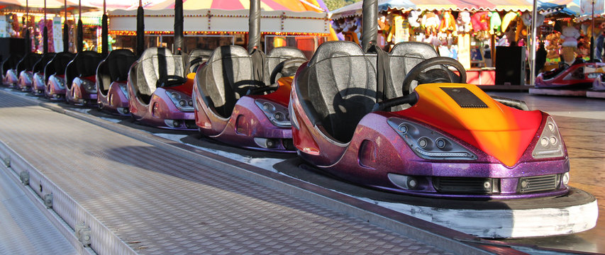 A Line of Dodgem Cars at a Fun Fair Amusement Park.