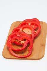 Sliced red pepper isolated on white background
