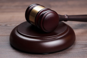 judge gavel on brown wooden table