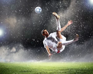Poster Foot joueur de football frappant le ballon