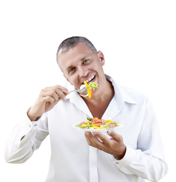 Adult Man Eating Fresh Vegetable Salad