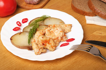 Potato slices with chicken