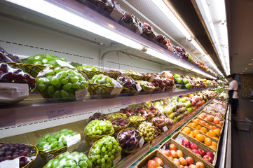 Shelf with fruits in supermarket