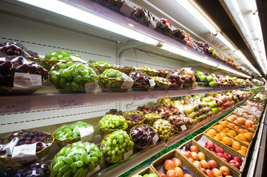 Shelf with fruits in supermarket