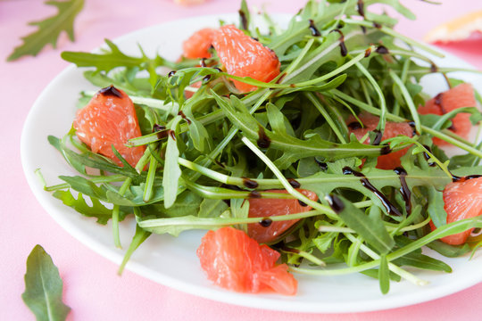 Delicious Salad Of Fresh Arugula And Grapefruit