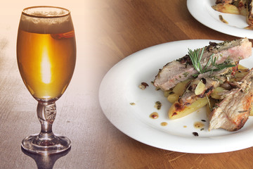 roast meat with potatoes and a glass of beer