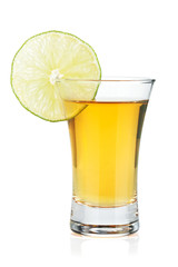Shot of gold tequila with lime slice