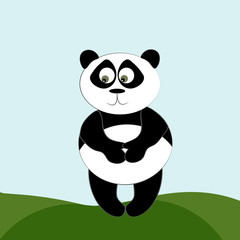 Obraz na płótnie Canvas panda in the grass