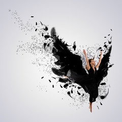 Woman floating   on dark wings