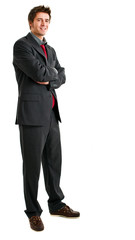 Full length businessman with folded arms