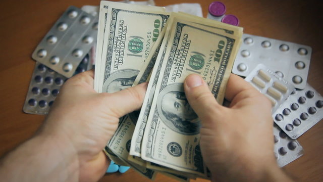 drugs, Dollars in hand, money in hand