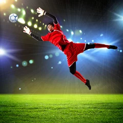 Foto auf Acrylglas Fußball Torwart fängt den Ball
