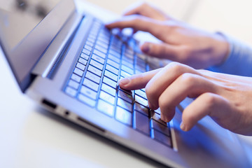 Click! Hands of a man on keyboard