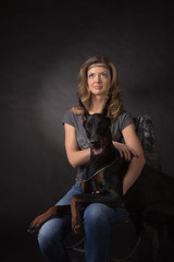 Woman with dobermann dog