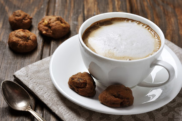 Cup of coffee with cookies