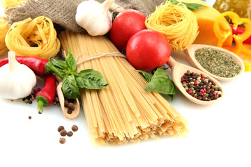 Pasta spaghetti, vegetables and spices, isolated on white
