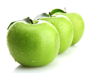 Ripe green apples with leaves  isolated on white