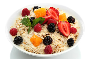 tasty oatmeal with berries, isolated on white