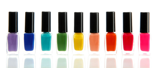 Obraz premium Group of bright nail polishes isolated on white