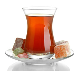 glass of Turkish tea and rahat Delight, isolated on white