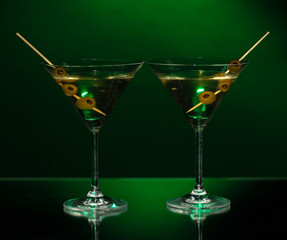 Martini glasses on dark background