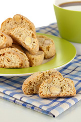 Aromatic cookies cantuccini and cup of coffee isolated on white