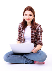 Beautiful young woman with laptop  isolated on white