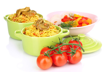 Delicious pilaf with vegetables isolated on white