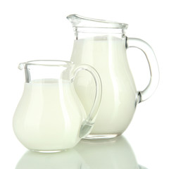 Two jugs of milk isolated on white
