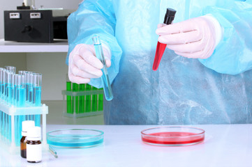 Scientist conducting research in laboratory close up