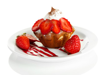 Tasty muffin cake with strawberries and chocolate