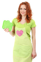 Obraz premium Young woman wearing kitchen apron holding potholder, isolated