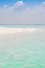 Waves on Shore of White Sand Beach