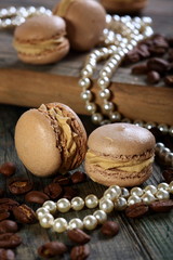 Homemade macaroons and coffee beans.