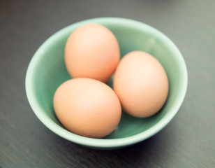 Three eggs in bowl