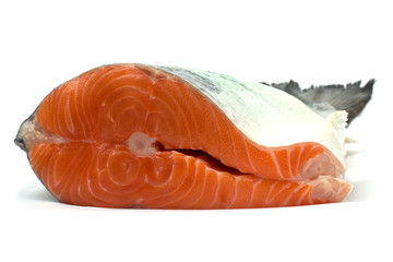 Raw salmon fillet isolated on white background
