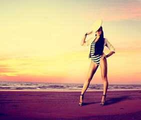 Glamour girl on the beach