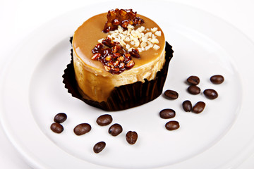 Little cake with caramel and nuts