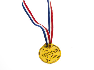 Gold medal winner pendant on a white background - 50997534