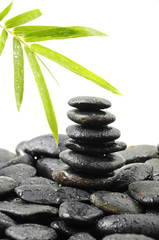 stones stack in balance and bamboo leaf