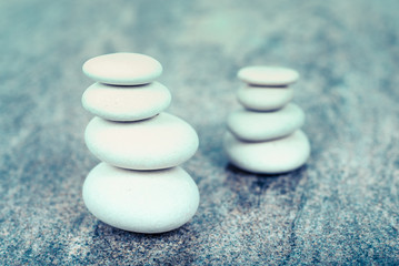 two stacks of white stones